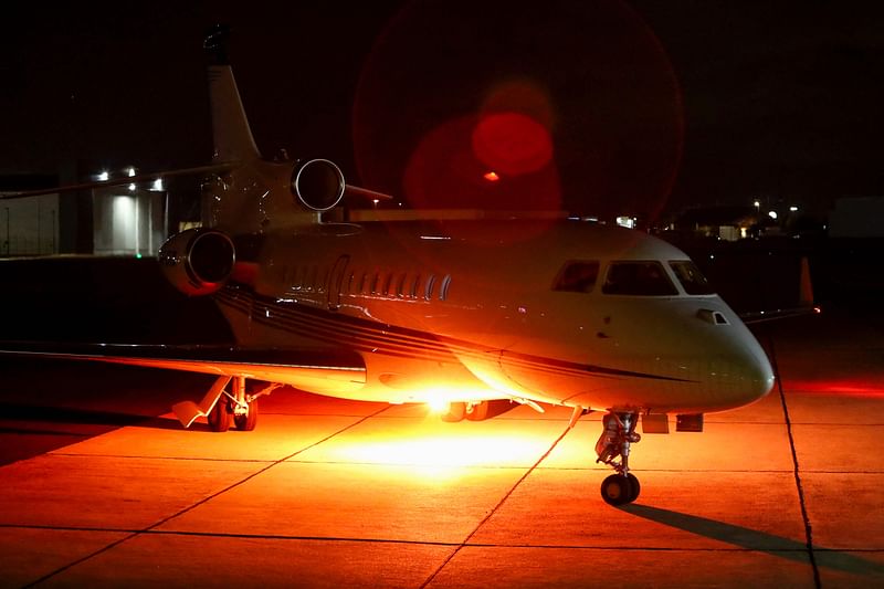 A private jet, transporting the coffin of Australian cricket player Shane Warne, arrives at the Melbourne airport from Bangkok on 10 March, 2022, after the cricketer died on the Thai holiday island of Koh Samui on 4 March