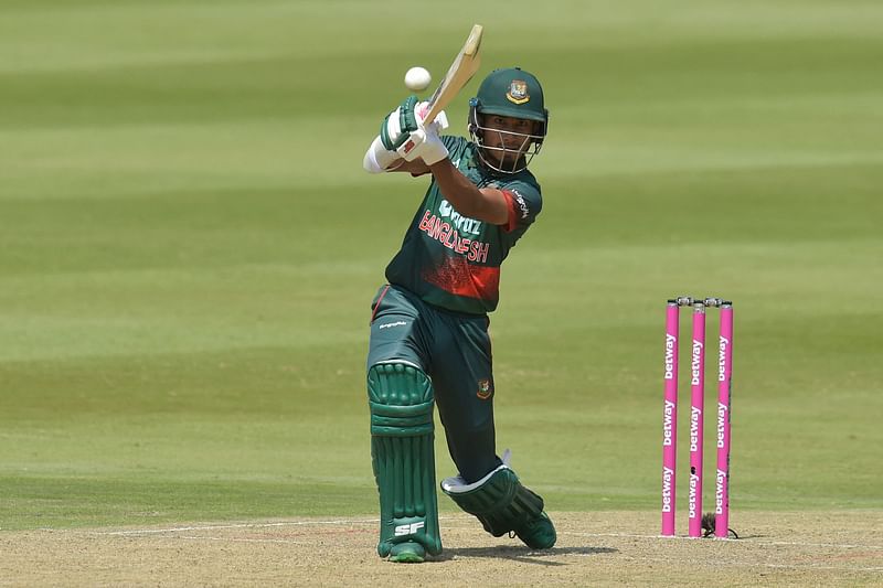 Bangladesh's Afif Hossain watches the ball after playing a shot during the second one-day international (ODI) cricket match between South Africa and Bangladesh at the Wanderers stadium in Johannesburg on 20 March 2022.