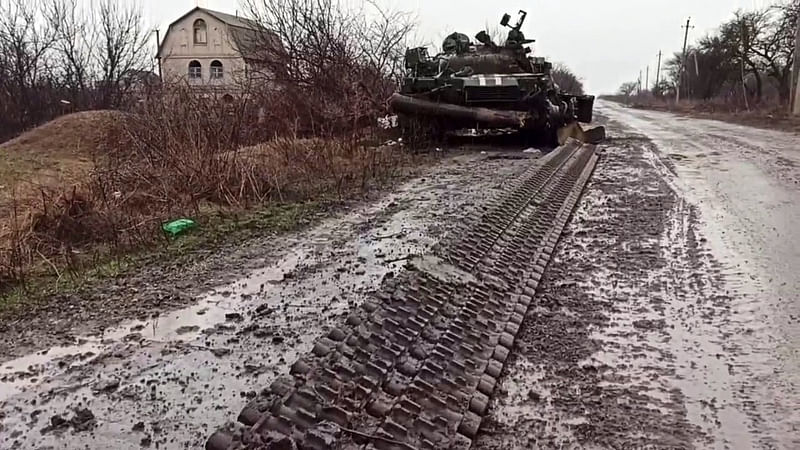 This screen grab obtained from a handout video released by the Russian Defence Ministry on 4 March 2022, shows a destroyed Ukrainian army tank in the settlement of Gnutovo outside Mariupo