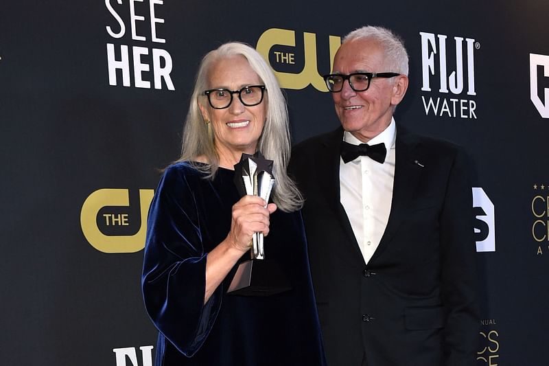 New Zealand director Jane Campion (L), winner of the award for Best Director for "The Power of the Dog", and Canadian producer Roger Frappier pose in the press room at the 27th Annual Critics Choice Awards at the Fairmont Century Plaza hotel in Los Angeles on 13 March, 2022