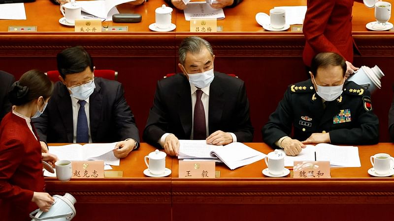 Chinese state councilor and foreign minister Wang Yi (M), at the opening session of the Chinese People's Political Consultative Conference (CPPCC) at the Great Hall of the People in Beijing, China on 4 March, 2022