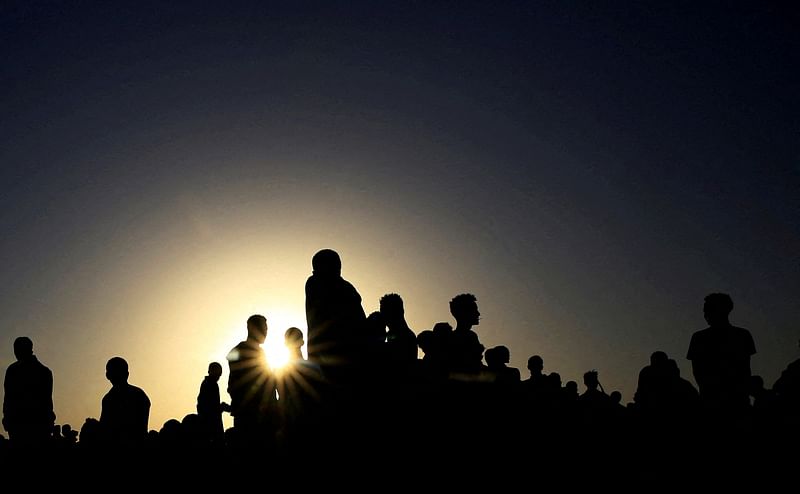 Ethiopians who fled the ongoing fighting in Tigray region, gather in Hamdayet village near the Sudan-Ethiopia border, eastern Kassala state