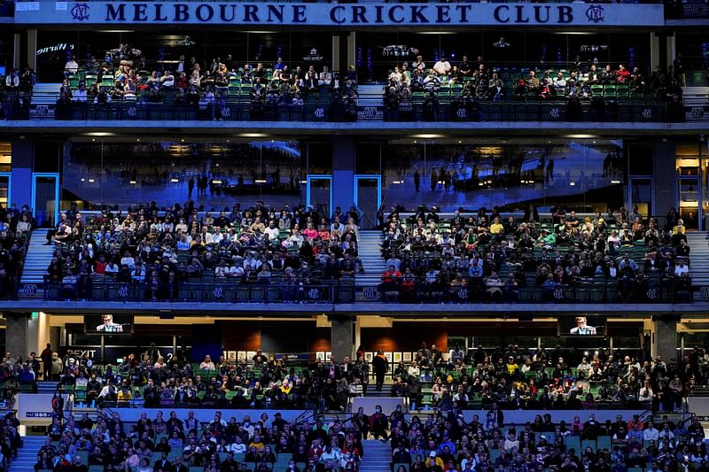 People attend a state memorial service for Australian cricketer Shane Warne at the Melbourne Cricket Ground, Australia 30 March, 2022.