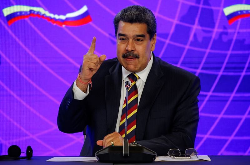 Venezuela's President Nicolas Maduro speaks beside Russian Deputy Prime Minister Yury Borisov (not pictured) after the signing of documents during a bilateral agreement at the Miraflores Palace during his visit to Caracas, Venezuela on 16 February, 2022.