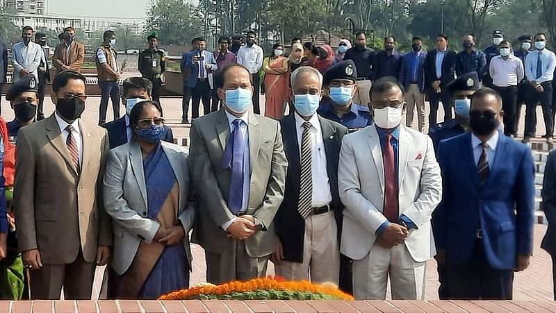 CEC Kazi Habibul Awal and other commissioners paid respect to the martyrs of the liberation war at the National Memorial in Savar on 1 March, 2022