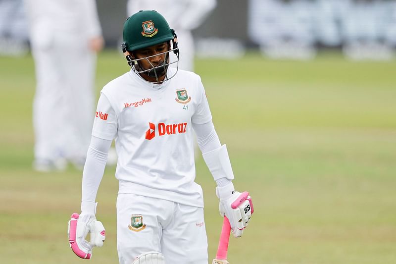 Mushfiqur Rahim walks back dejected after throwing his wicket away on Day 3 of the second Test against South Africa in Port Elizabeth on 10 April 2022