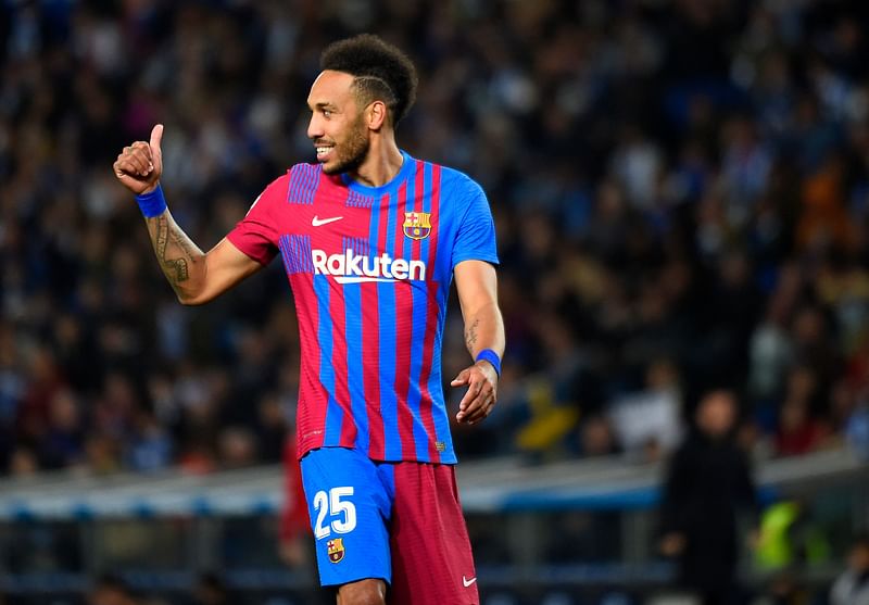 Barcelona's Pierre-Emerick Aubameyang gestures during their La Liga match against Real Sociedad at the Anoeta stadium in San Sebastian on 21 April, 2022.