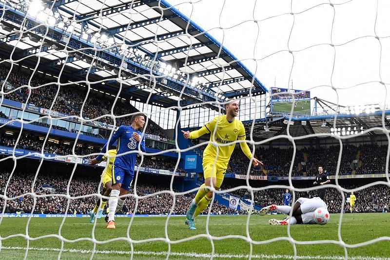 Brentford's Danish midfielder Christian Eriksen celebrates after scoring a goal during the English Premier League football match between Chelsea and Brentford at Stamford Bridge in London on 2 April, 2022