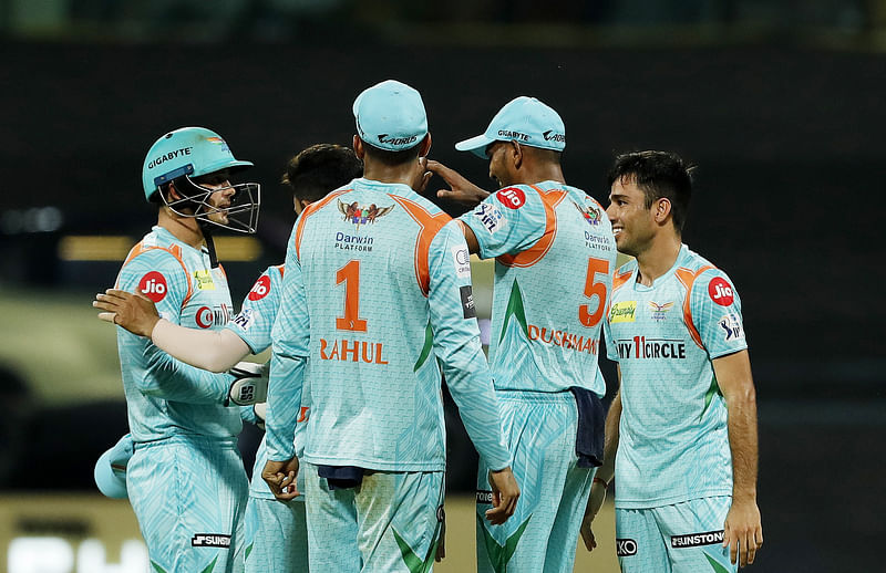 Lucknow Super Giants players celebrates the dismissal of Mumbai Indians Ishan Kishan during an IPL 2022 match between Lucknow Super Giants and Mumbai Indians at Wankhede Stadium in Mumbai on 24 April, 2022