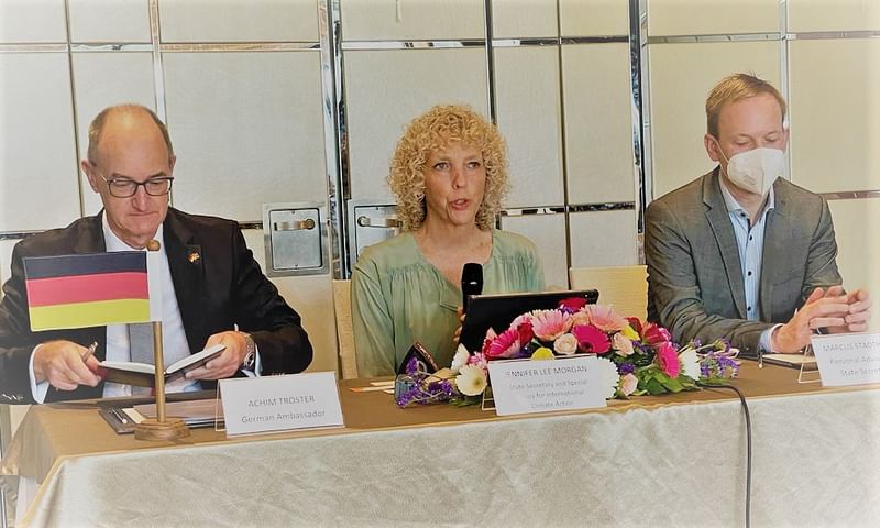 State secretary and special envoy for international climate policy of the Federal Republic of Germany, Jennifer Morgan (C) talks to media