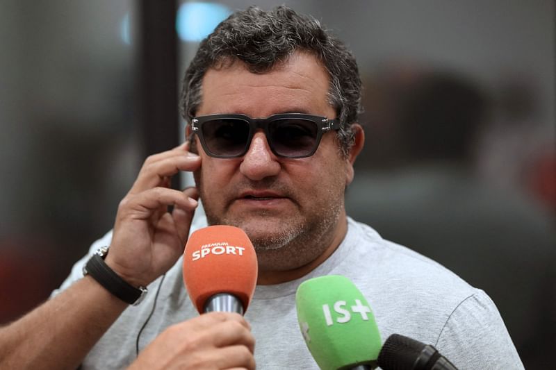 In this file photo taken on 2 September, 2016 Italian-born Dutch football agent Mino Raiola speaks to journalists during the presentation of Nice's football club new signings at the Allianz Riviera stadium in Nice, southeastern France