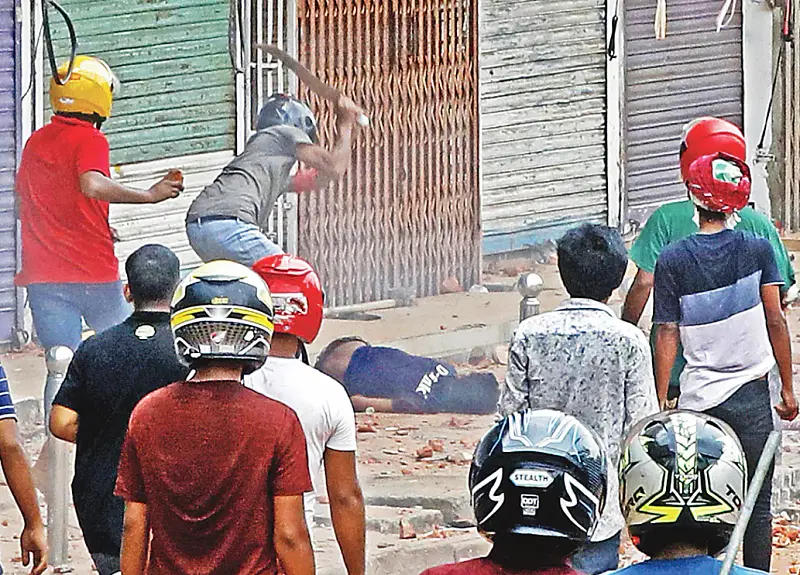 During the clashes between students and traders Nahid Hossain was seen being hacked on Tuesday afternoon.