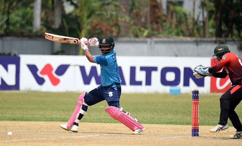 Tamim Iqbal plays a shot during a DPL match against Rupganj Tigers Cricket Club on 26 April, 2022