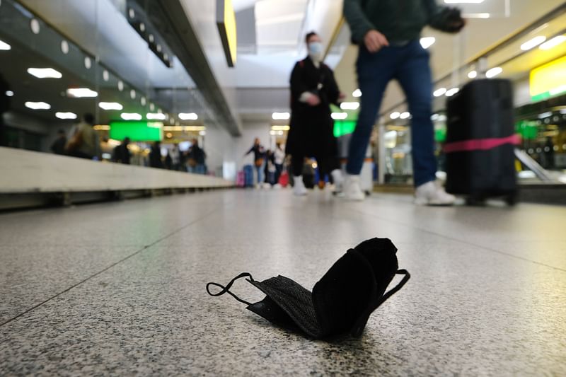 A mask is seen on the ground at John F. Kennedy Airport on 19 April 2022 in New York City