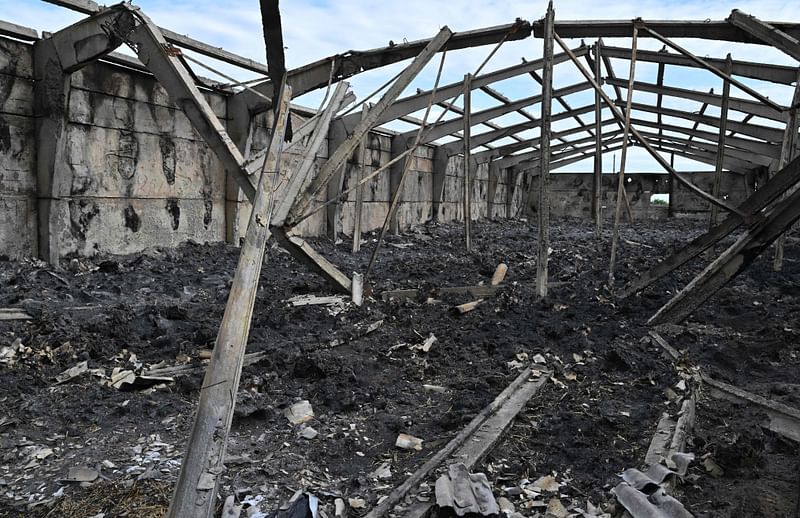 A photograph shows a warehouse destroyed after shelling in February 2022, at a farm in southern Ukraine’s Odessa region, on 22 May, 2022, on the 88th day of the Russian invasion of Ukraine