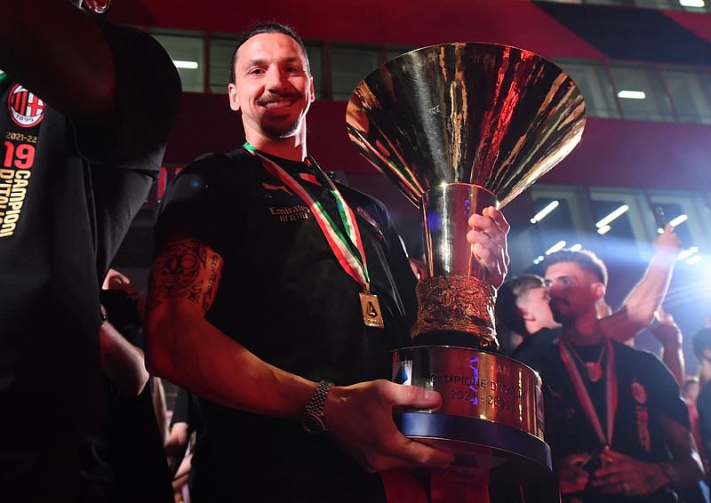 AC Milan forward Zalatan Ibrahimovich with the Scudetto trophy