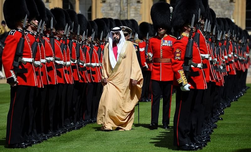 United Arab Emirates President Sheikh Khalifa bin Zayed al-Nahayan reviews an honour guard during a ceremonial welcome at Windsor Castle, in Windsor, southern England 30 April, 2013