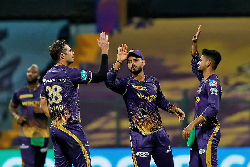 Kolkata Knight Riders Tim Southee celebrate the dismissal of Rajasthan Royals Jos Buttler during the Indian Premier League 2022 match between Kolkata Knight Riders and Rajasthan Royals, at Wankhede Stadium in Mumbai on 2 May 2022