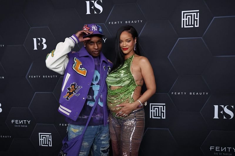 In this file photo taken on 11 February, 2022 ASAP Rocky and Rihanna pose for a picture as they celebrate her beauty brands Fenty Beauty and Fenty Skinat Goya Studios in Los Angeles, California. Superstar Rihanna and rapper A$AP Rocky have reportedly welcomed a baby boy, pop industry news website TMZ reported on 19 May, 2022.