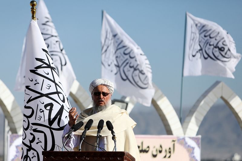 Afghan deputy prime minister Mawlavi Abdul Salam Hanafi speaks during a ceremony to raise the Taliban flag in Kabul, Afghanistan, 31 March, 2022