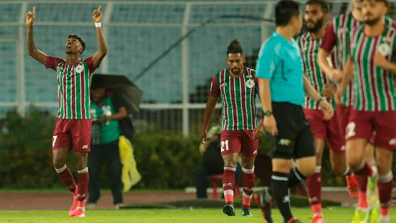 ATK Mohun Bagan winger Liston Colaso (L) celebrates after scoring against Bashundhara Kings in their second group D match of the AFC Cup at the Salt Lake Stadium in Kolkata on 21 May, 2022