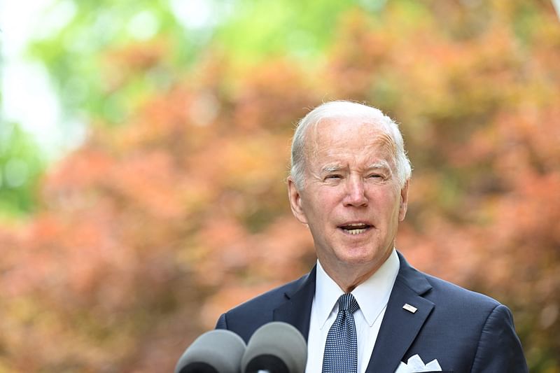 US President Joe Biden speaks to the media next to Hyundai Motor Group Chairman Chung Eui-sun at a hotel in Seoul on 22 May, 2022