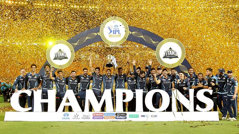 Gujarat Titans squad celebrates with the trophy after winning IPL 2022 against Rajasthan Royals, at Narendra Modi Stadium in Ahmedabad on 29 May, 2022