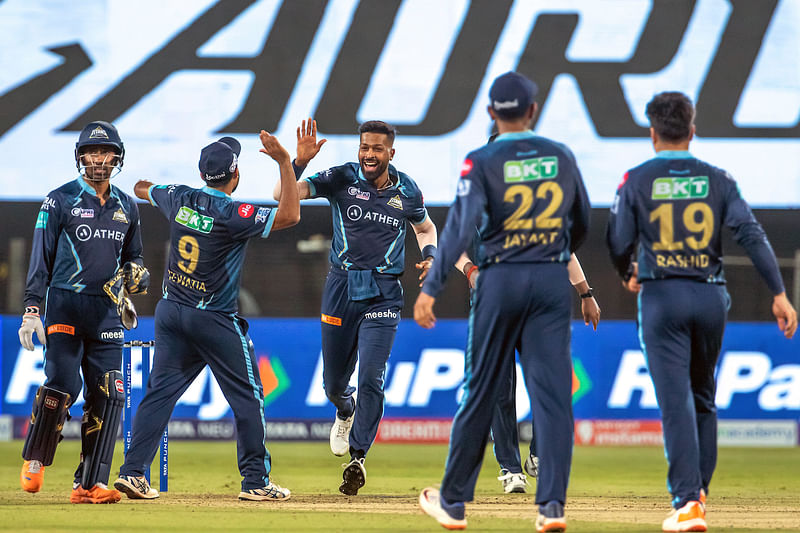 Gujarat Titans players celebrates after winning the Indian Premier League 2022 match against Lucknow Super Giants, at Maharashtra Cricket Association Stadium in Pune on Tuesday