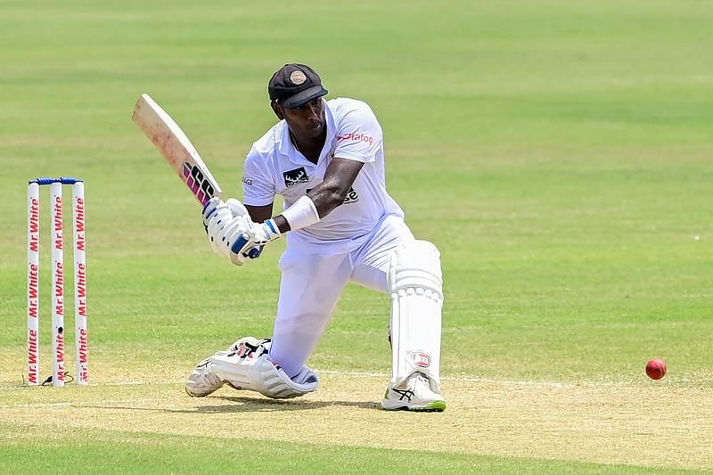 Sri Lanka's Angelo Mathews plays a shot during the second day of the first Test cricket match between Bangladesh and Sri Lanka at the Zahur Ahmed Chowdhury Stadium in Chittagong on 16 May, 2022