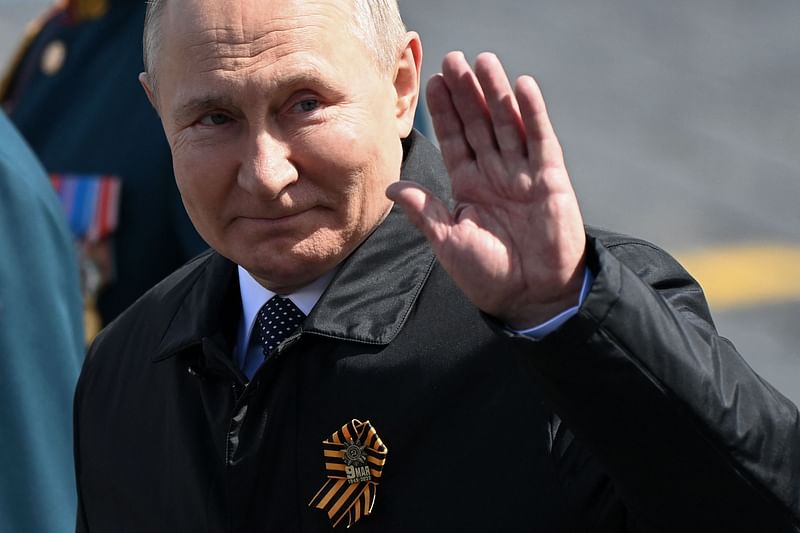 Russian president Vladimir Putin leaves Red Square after the Victory Day military parade in central Moscow on 9 May, 2022. Russia celebrates the 77th anniversary of the victory over Nazi Germany during World War II