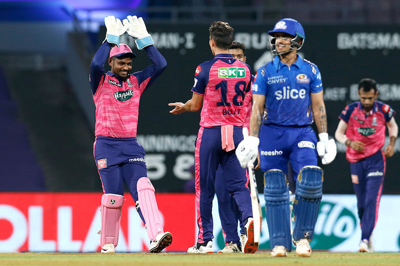 Rajasthan Royals Trent Boult celebrates the dismissal of Mumbai Indians Ishan Kishan during the Indian Premier League 2022 cricket match between Rajasthan Royals and Mumbai Indians, at the DY Patil Stadium in Mumbai on 30 April 2022