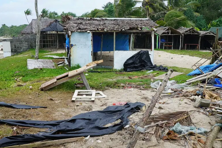 Damaged buildings are seen near Vanuatu's capital Port Vila in 2020 after Tropical Cyclone Harold pounded the islands