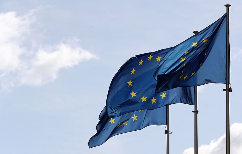 The European Union flags flutter at the EU Commission headquarters in Brussels, Belgium on 19 September, 2019