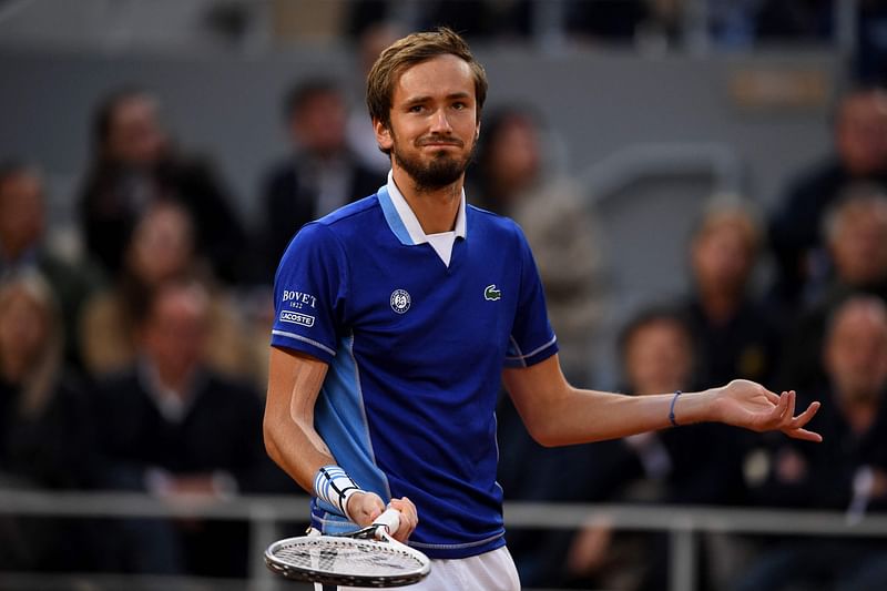 Russia's Daniil Medvedev reacts as he plays against Croatia's Marin Cilic during their men's singles match on day nine of the Roland-Garros Open tennis tournament at the Court Philippe-Chatrier in Paris on May 30, 2022