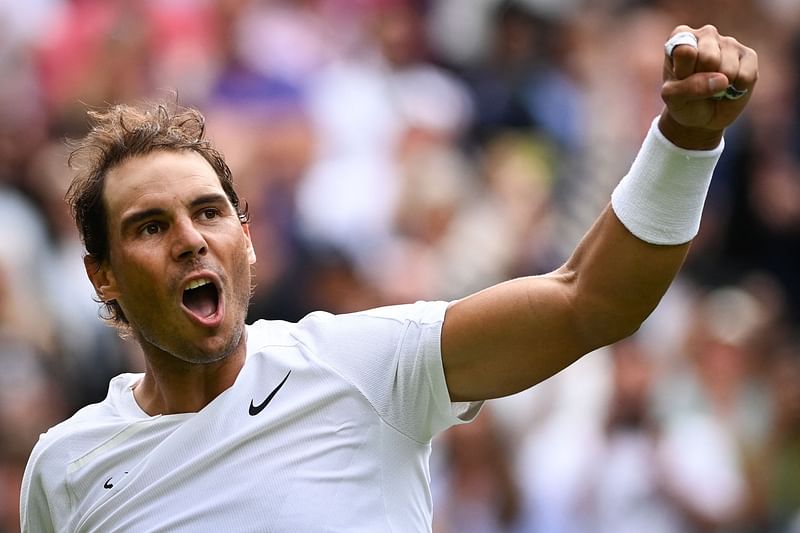 Spain's Rafael Nadal celebrates winning against Argentina's Francisco Cerundolo at the end of their men's singles tennis match on the second day of the 2022 Wimbledon Championships at The All England Tennis Club in Wimbledon, southwest London, on 28 June, 2022