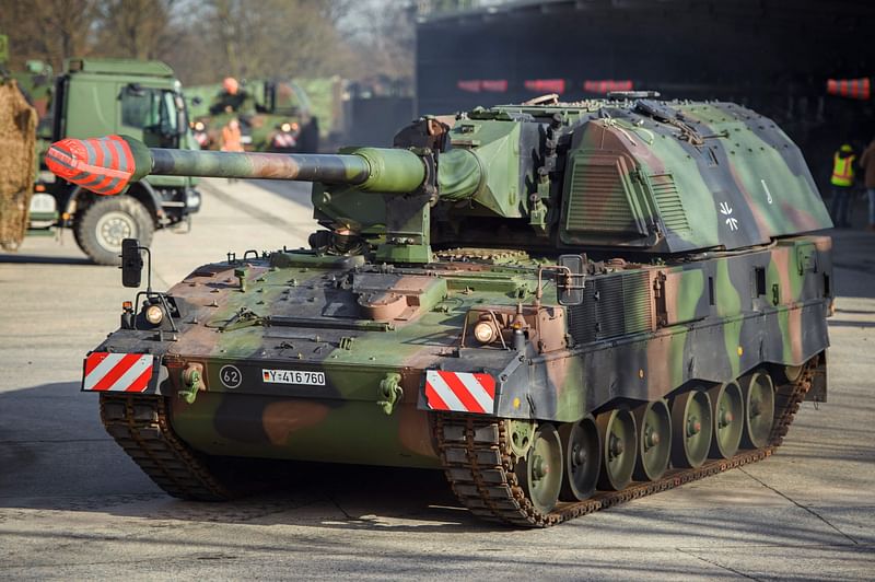 In this file photo taken on 14 February 2022 a tank with mounted howitzers („Panzerhaubitze 2000“) of the German armed forces Bundeswehr drives to be loaded onto a heavy-duty transporter in the Hindenburg barracks in Munster, western Germany. Ukraine said on 21 June 2022 it had "finally" deployed advanced German artillery system, in the latest delivery of the long-range, precision weapons that it has been calling for