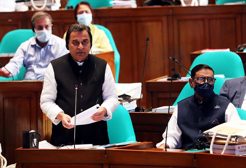 Finance Minister AHM Mustafa Kamal places the proposed national budget for FY23 at the Jatiya Sangsad (parliament) on 9 June 2022