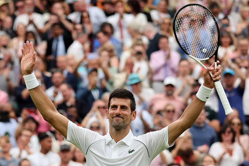 Serbia's Novak Djokovic celebrates beating South Korea's Kwon Soon-woo after their men's singles tennis match on the first day of the 2022 Wimbledon Championships at The All England Tennis Club in Wimbledon, southwest London, on 27 June, 2022