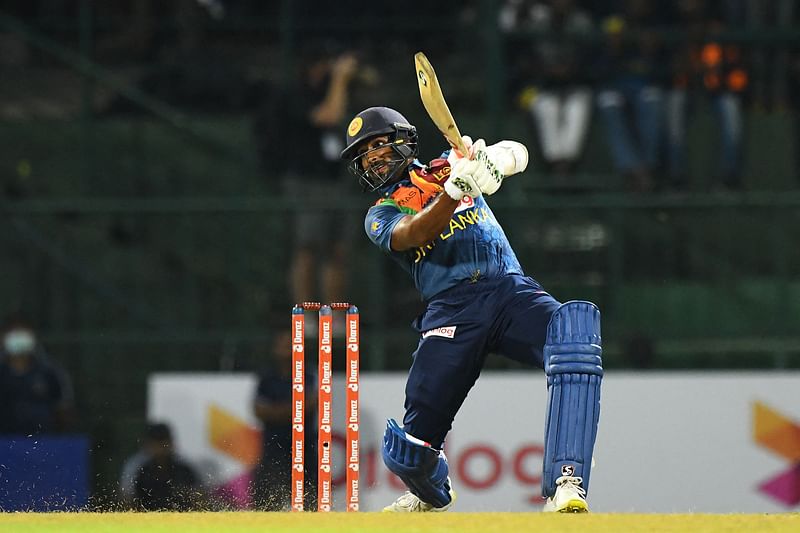 Sri Lanka's Chamika Karunaratne plays a shot during the third and final Twenty20 international cricket match between Sri Lanka and Australia at the Pallekele International Cricket Stadium in Kandy on 11 June, 2022