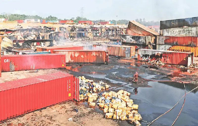 Garments products strewn here and there as various sections of BM Container Depot in Sitakunda is blown off due to the explosion. The photo is taken on 6 May 2022