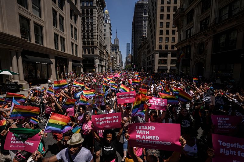 Participants march during the 2022 New York Pride Parade in New York City on 26 June, 2022