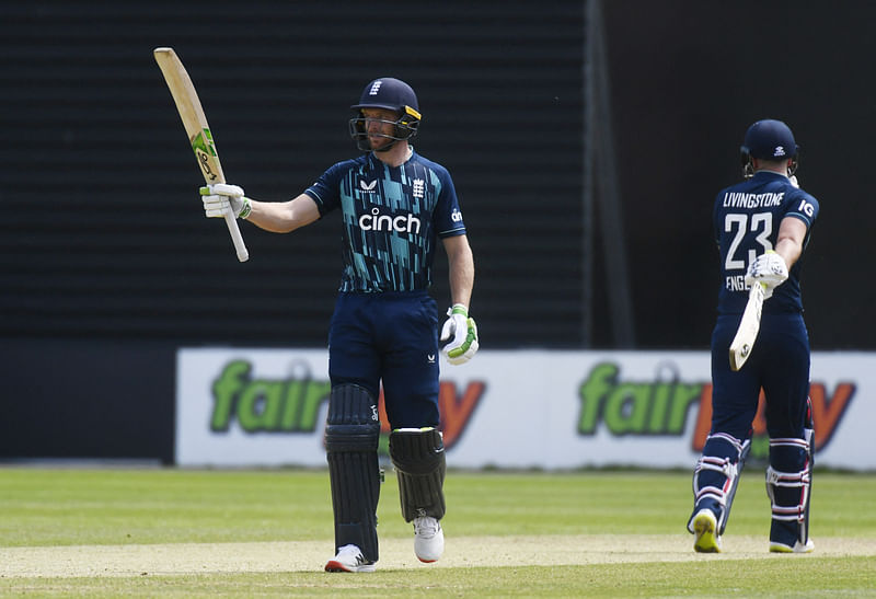 England's Jos Buttler celebrates after completing 150 against Netherlands in their ODI match in Amsterdam, Netherlands on 17 June, 2022