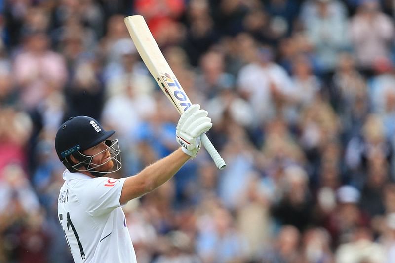 England's Jonny Bairstow celebrates after scoring a 150 runs on day 3 of the third cricket Test match between England and New Zealand at Headingley Cricket Ground in Leeds, northern England, on 25 June, 2022