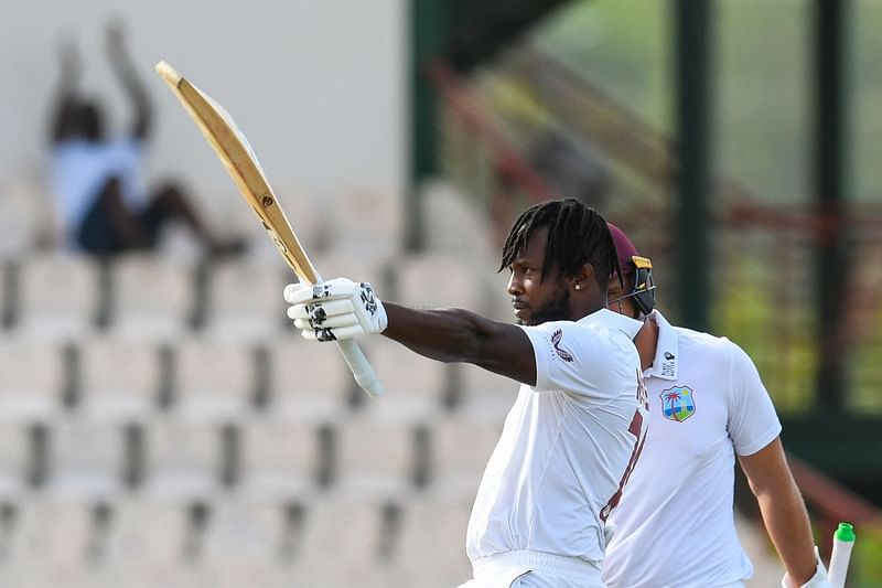 Kyle Mayers, of West Indies, celebrates his century during the second day of the 2nd Test between Bangladesh and West Indies at Darren Sammy Cricket Ground in Gros Islet, Saint Lucia, on 25 June, 2022