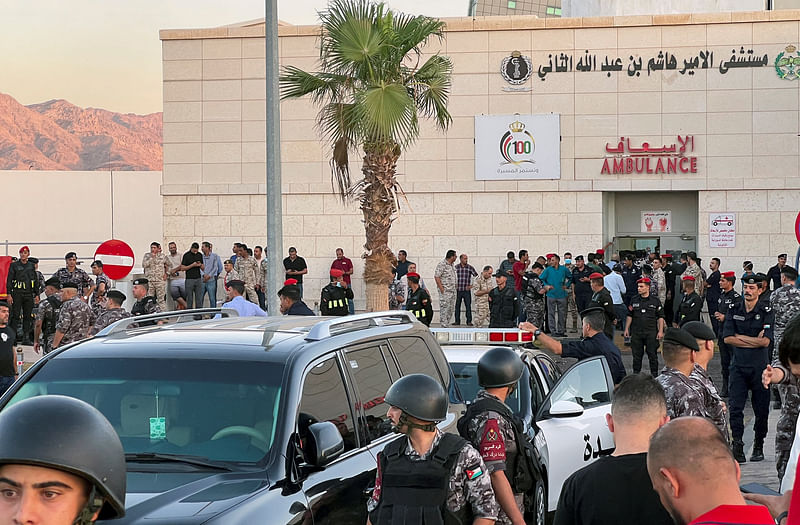 Members of the Jordanian Gendarmerie stand outside a hospital after toxic gas leak from a storage tank in Jordan's Aqaba port, Jordan on 27 June, 2022