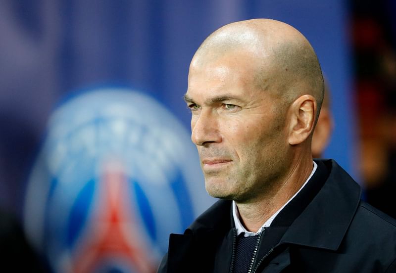 In this file photo taken on September 18, 2019, then Real Madrid's French coach Zinedine Zidane looks on prior to the start of an UEFA Champions league Group A football match