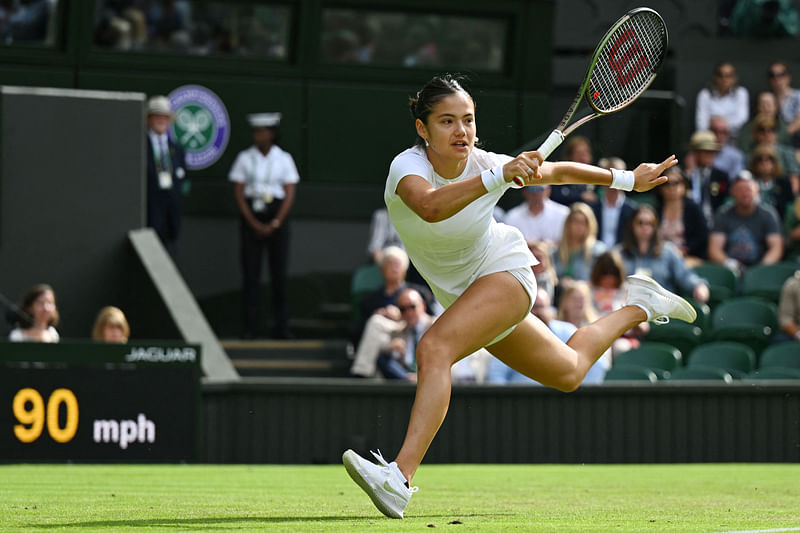 Britain's Emma Raducanu returns the ball to France's Caroline Garcia during their women's singles tennis match on the third day of the 2022 Wimbledon Championships at The All England Tennis Club in Wimbledon, southwest London, on 29 June, 2022