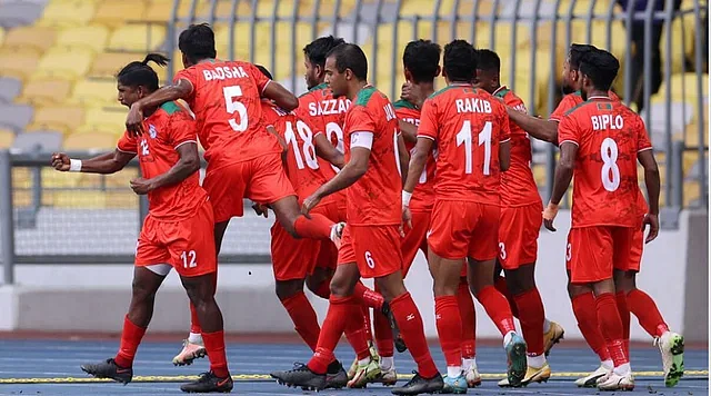 Bangladesh players celebrate after scoring against Turkmenistan