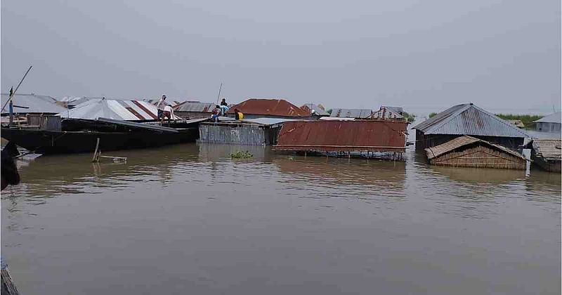 Houses are still under water as the flood water is receding slowly in Sylhet