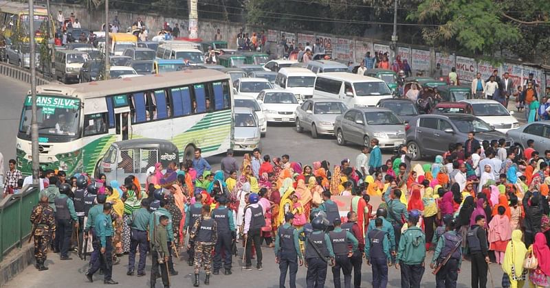 RMG workers stage demo in city demanding wage hike